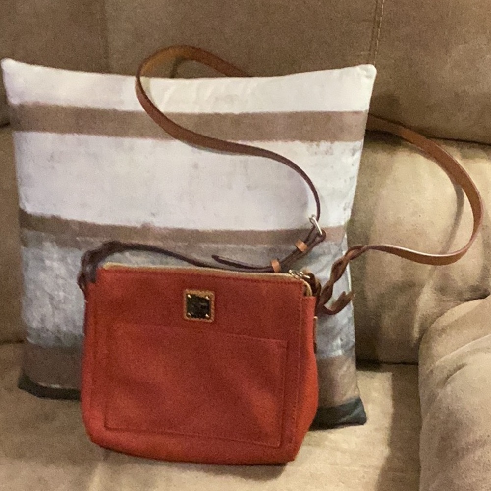 Dooney and Bourke red pebble leather small shoulder bag withh tan strap